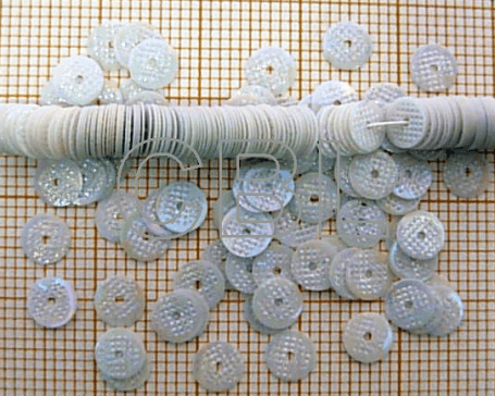 Paillettes texturées sur fil PA 90/08