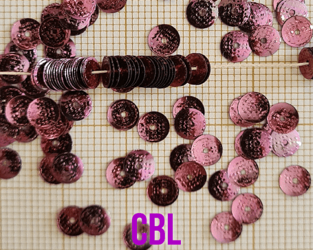 Paillettes texturées sur fil PA 26/13